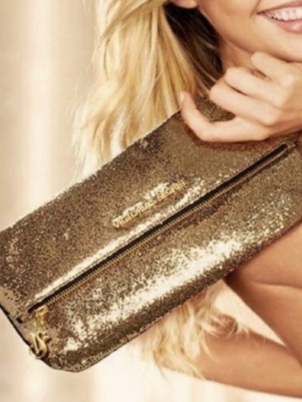 Victoria’s Secret gold fold over bag